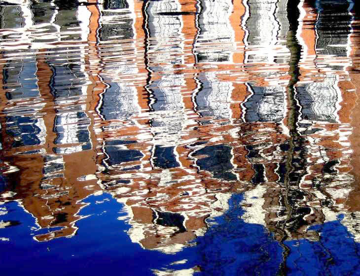 Reflections in water in Amsterdam canal
