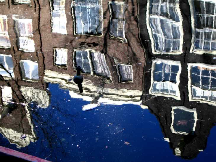 Window reflections with floating bottle