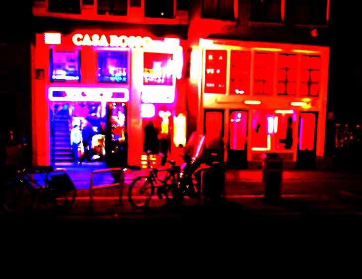 Lurid light in the Amsterdam night. Oudezijds Achterburgwal