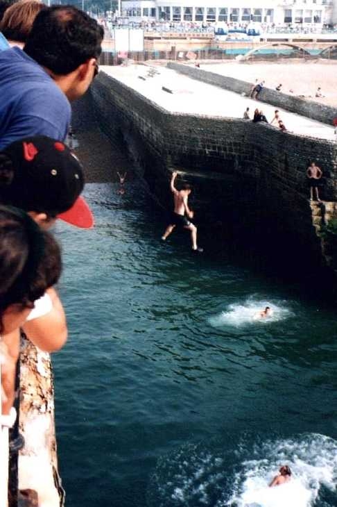 Jumping from the pier, Brighton, Sussex