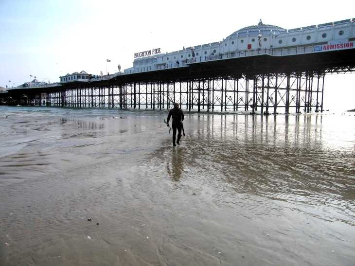 Frogman and pier, Brighton, Sussex