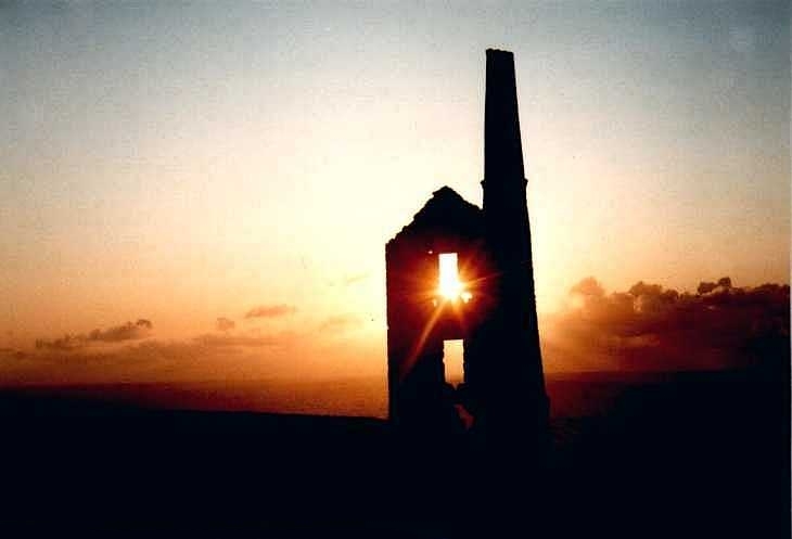Sunset behind tin mine, Cornwall