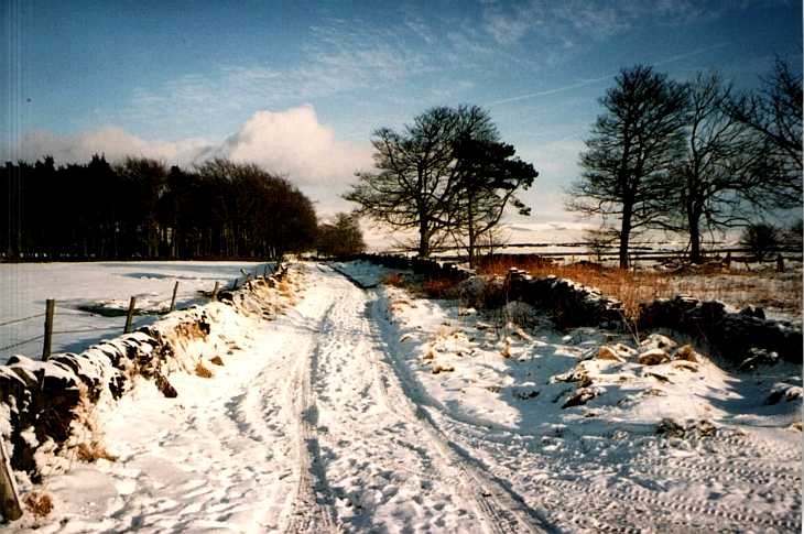 Snow-covered road, The Peak District