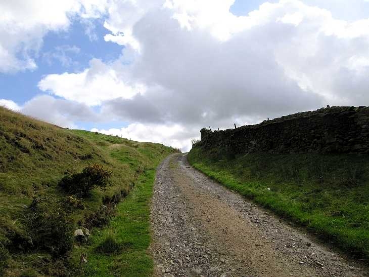 Track and clouds, The Peak District