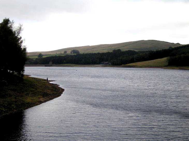 Fisherman on a grey day at The Errwood Reservoir
