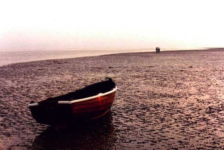 Couple on beach, Worthing, Sussex