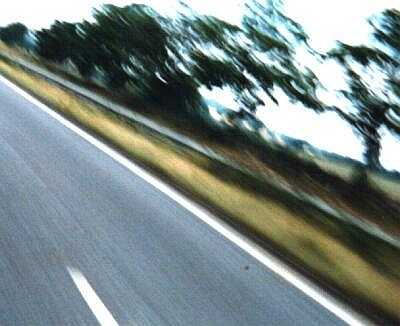 From a speeding motorcycle, experimental photograph