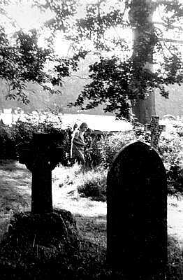 Children in a churchyard, Hertfordshire