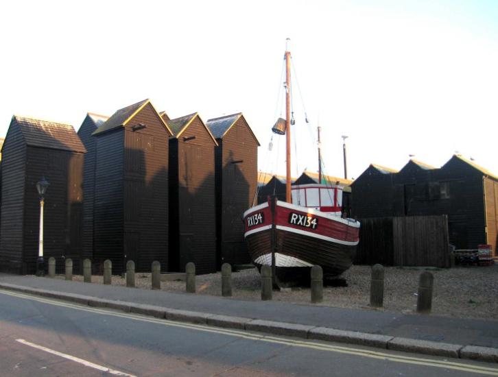 Fishing boat and net drying huts at Hastings